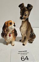 Front view of Lady and the Tramp ceramic figurines showing detailed painting and condition.