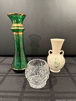 Group view of three vases