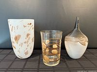 Group shot of all three glass vases showing shapes, patterns and relative sizes