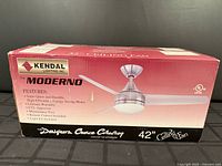 Factory-sealed box showing full view of Kendal Lighting Moderno 42" ceiling fan
