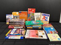 Front view of entire collection of travel guidebooks