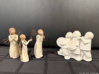 Group shot of three Willow Tree angels and MarBell stone musicians sculpture