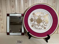 Photo showing the Royal Jubilee plate with stand and small stained glass edge hanging mirror together on a shelf.