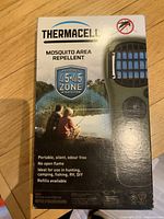 Front of Thermacell mosquito area repellent box in English, highlighting 4.5x4.5 protection zone and use cases.