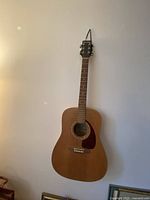 Front view showing full guitar body, neck, and headstock