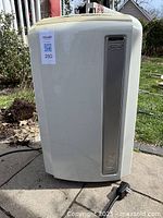 Front view of unit showing Pinguino logo and power cord