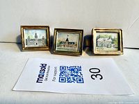 Full view of three miniature framed watercolor paintings displayed in a row showing Eastern Ontario landmarks, signed Korponay.