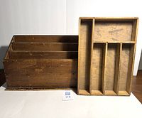 Side-by-side view of the wooden letter rack and cutlery tray on a white surface, showing their relative sizes and natural wood finish.