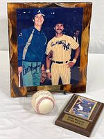 Full lot view showing the signed baseball, the photo plaque with Dale Murphy and Don Mattingly, and the plaque with Dale Murphy baseball card.