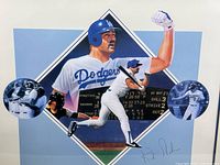 Close-up of the lithograph showing Kirk Gibson images, scoreboard backdrop, and autograph signatures on print.