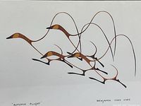 Close-up of the artwork showing stylized birds and artist signature.