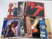 Photo showing 10 vintage rock vinyl albums with various album covers including Bob Dylan, Tom Petty, ZZ Top, Elton John, Mick Jagger and Bruce Springsteen.