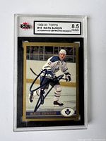 Front view of the 1999-00 Mats Sundin hockey card in Toronto Maple Leafs uniform, card graded 8.5 NM+ with autograph visible, encapsulated by KSA.