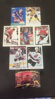 Full layout of eight hockey cards featuring Brian Leetch, Bernie Nicholls, Phil Kessel, and others set on dark background