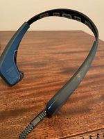 Front view of the black Muse brain sensing headband showing shape and electrodes.