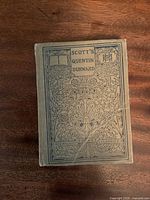 Front cover of the 1914 edition of Sir Walter Scott's Quentin Durward book, showing decorative artwork and series labeling.