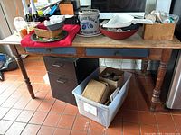 Front view of desk with items on top