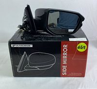 Side mirror placed on its original A-Premium branded box showing the front and side profile.