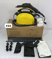 Full set displayed with the steam cleaner unit on box, brushes, mop heads, extension tubes, and cloths.