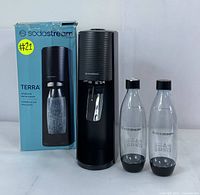 SodaStream Terra sparkling water maker with two bottles and original box.
