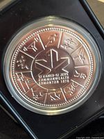 Reverse side of the coin showing Commonwealth Games sports icons and maple leaf with text honoring Edmonton 1978.