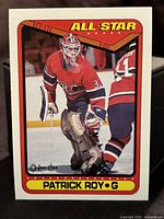 Front side of the Patrick Roy hockey card showing All-Star designation and photo of Roy in goalie gear.