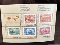 Full view of the 1982 Canada 82 International Philatelic Youth Exhibition souvenir sheet showing six stamps with varying denominations and classic Canadian imagery.