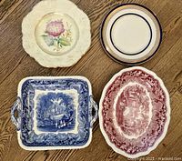 Group shot of all four plates showing size, shape, and decoration