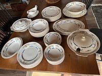 Overall view of the 63-piece Eastbourne pattern dinnerware on table