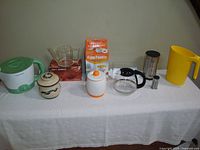 All nine kitchen items laid out on table