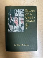 Front cover of green hardcover book with title 'Ballads of a Cheechako' and illustration of frontiersman and dog.