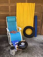 Full lot with all items visible including chair, mat, inner tube, grill and accessories.