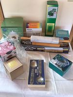 Various new kitchen and home items displayed together, all in original boxes.