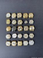 Twenty-five vintage wristwatch cases arranged in five rows of five