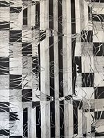 Close-up of the abstract black and white pen and ink drawing showing intricate line work and mask designs.