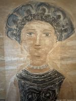 Close-up of the central figure’s face and headdress in the lithograph