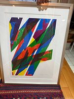 Frontal shot of framed Piero Dorazio color abstract print showing full print, mat, and frame