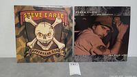 Both Steve Earle vinyl LP albums displayed side by side showing album covers for Copperhead Road and Guitar Town.