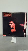 Front cover of James Brown 'Hot Pants' vinyl LP album showing artist portrait and album title