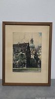 Full framed etching of Dresden Castle showing wooden frame and matting.