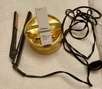 CHI Air flat iron, MAC gold makeup bag, The Ordinary serum box overview