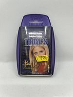 Front of Top Trumps Buffy card deck in purple case