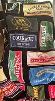 Full view of blanket showing multiple beer towels stitched together