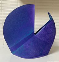 Front view of purple and blue sculptural vase