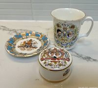 Overall view of mug, dish and trinket box