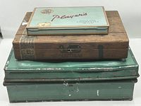 Stacked view of all three boxes showing relative sizes and branding