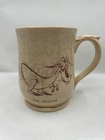 Side view showing creature illustration and overall mug shape