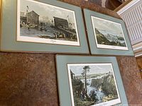 Three placemats arranged on a table, showing historical Canadian scenes from 1841 including Toronto, Kingston, and Rideau Canal.