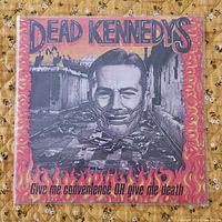 Front cover of Dead Kennedys vinyl album showing artwork with man gagged and flames with band name and album title