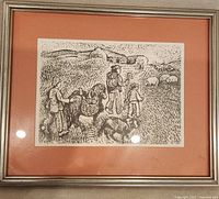 Framed woodcut with matting and silver frame showing the full piece including human figures, dog, donkey, and sheep in a pastoral scene